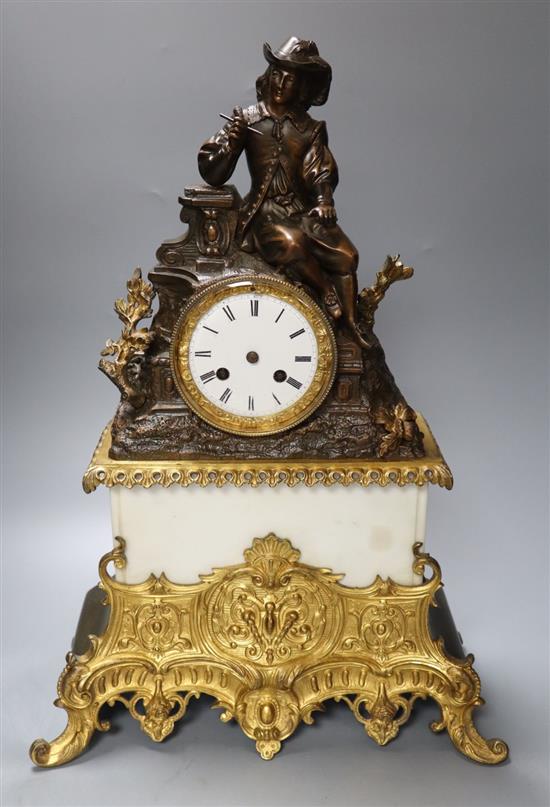 A 19th century bronze, ormulu and white marble mantel clock, with seated male surmounted, French striking movement, height 44cm